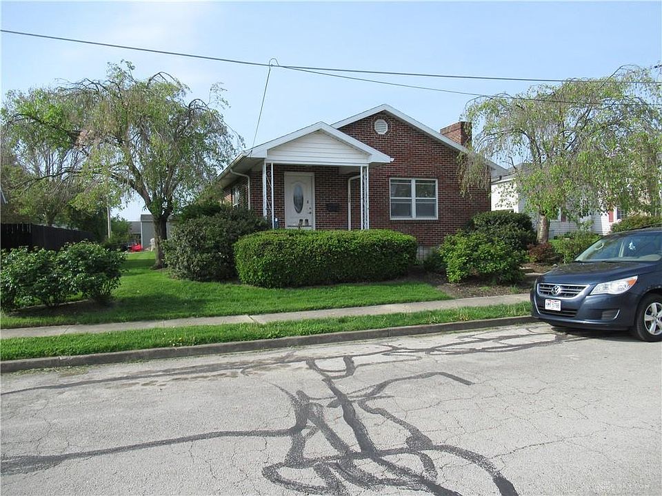 1st image of 106 E 1st St