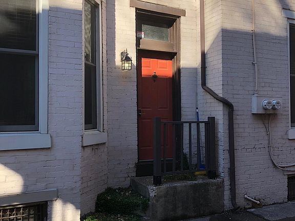 Side door to property. One of the two entrances into the first floor apartment.