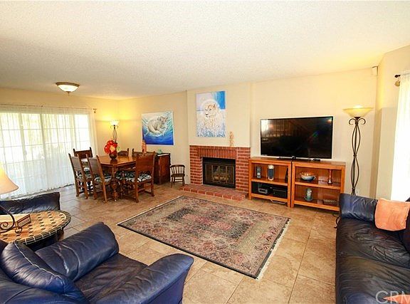 Open Family Room and Dining Room View 1