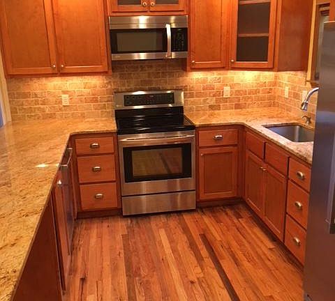 Dishwasher, oven, microwave, sink, and refrigerator were all