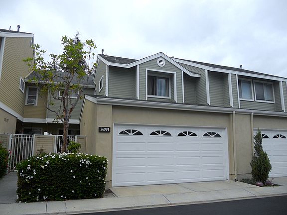 Dual Master with two car attached garage