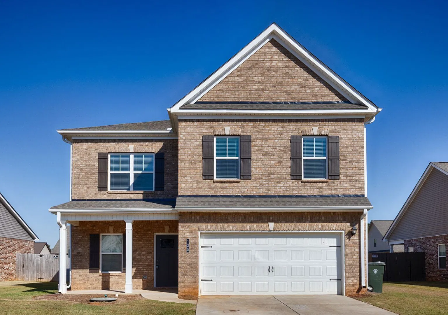Spacious 4-Bedroom Home with Large Living & Dining Areas — Photo 1