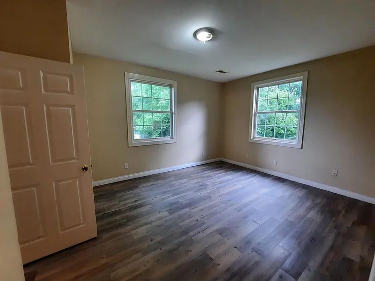 Master Bedroom with vinyl plank flooring