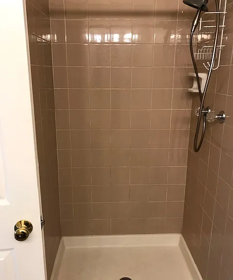 Shower bathroom attaches to bedroom 2.