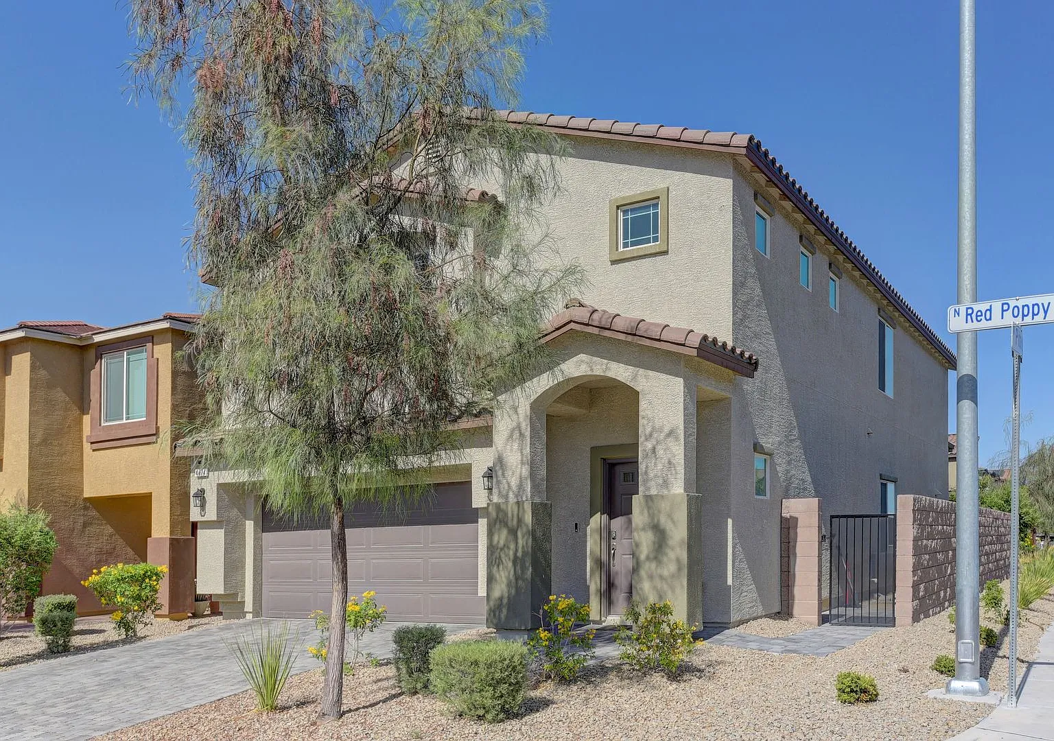 Beautiful Two-Story Home Featuring Attractive Desert Landscaping. — Photo 2