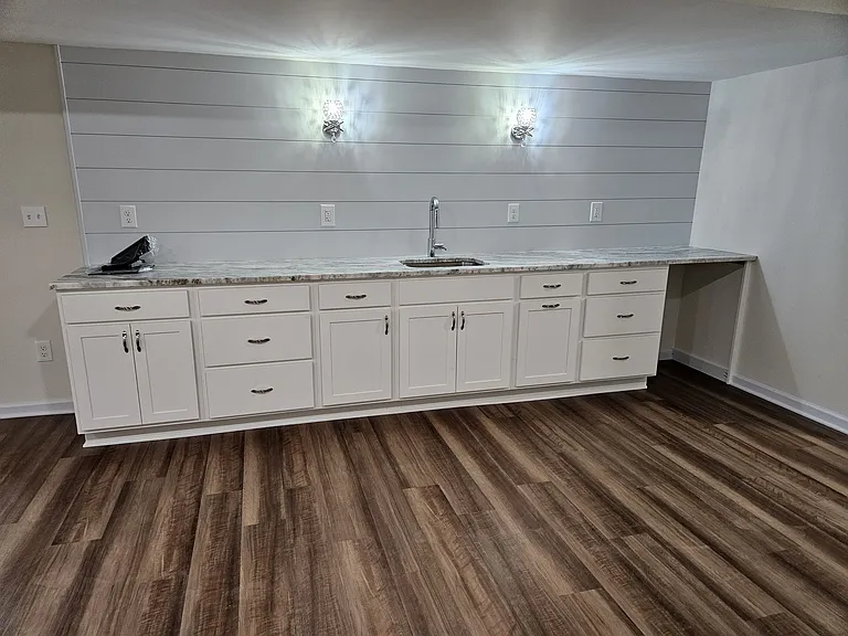 Game room opens into kitchenette area