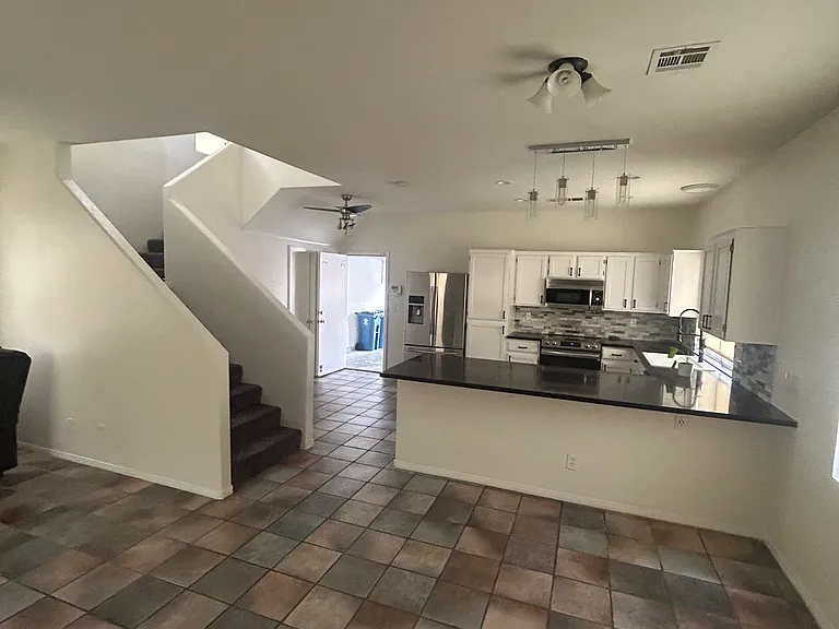 View from front door into living room and kitchen