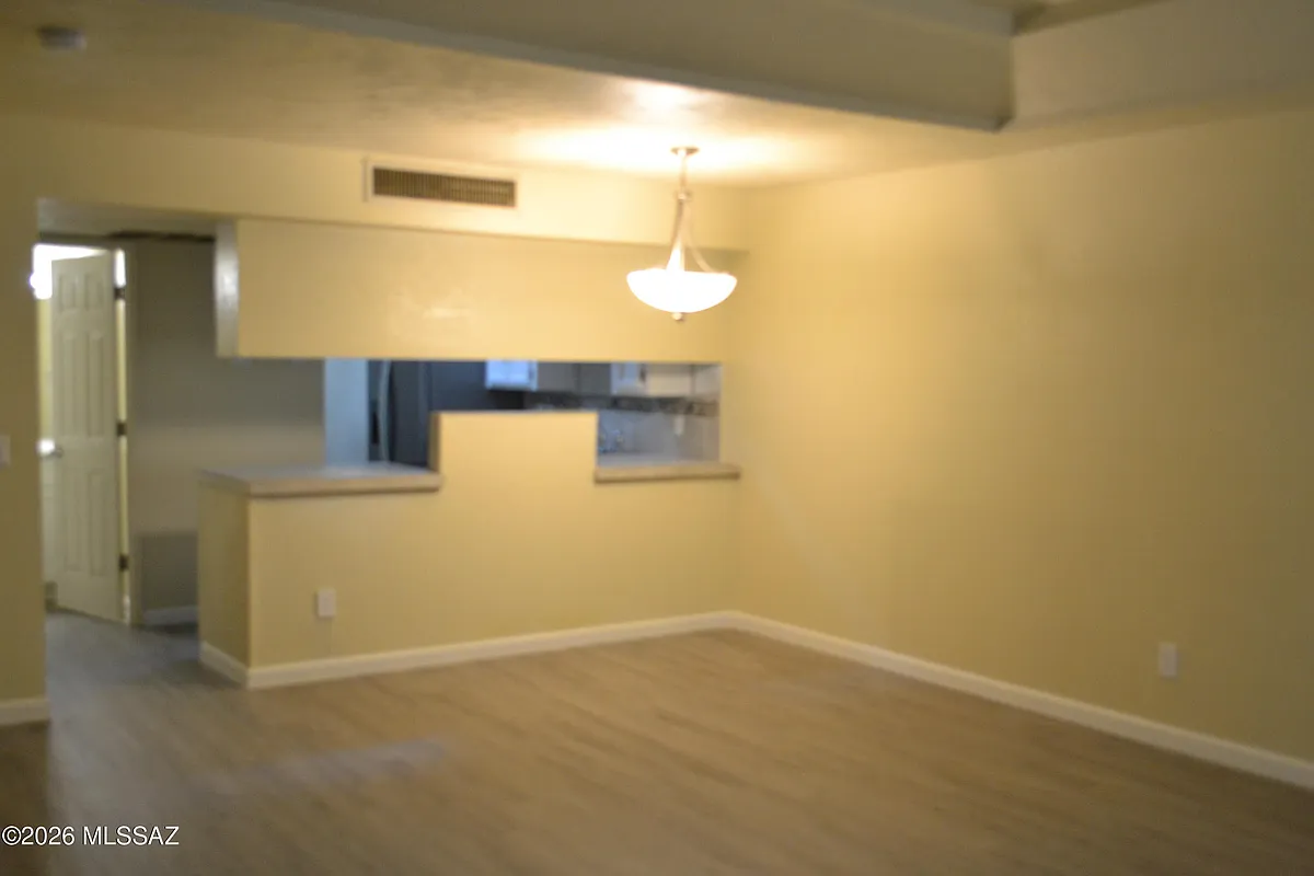 Building Photo - 1200 E River Rd #D-47