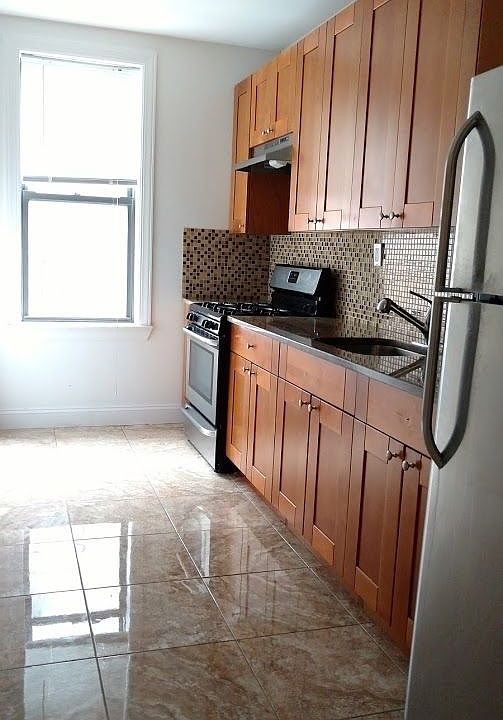1st image of 8742 Elmhurst Ave APT 3C