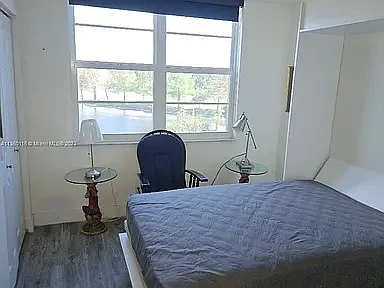 Bedroom 2 with built in bed and cabinets