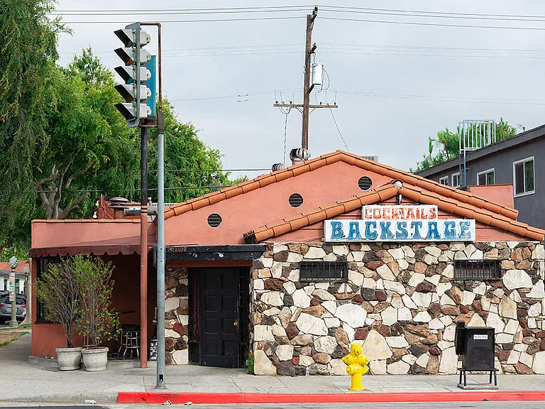 Backstage Bar and Grill is a local haunt, great for drinks and karaoke