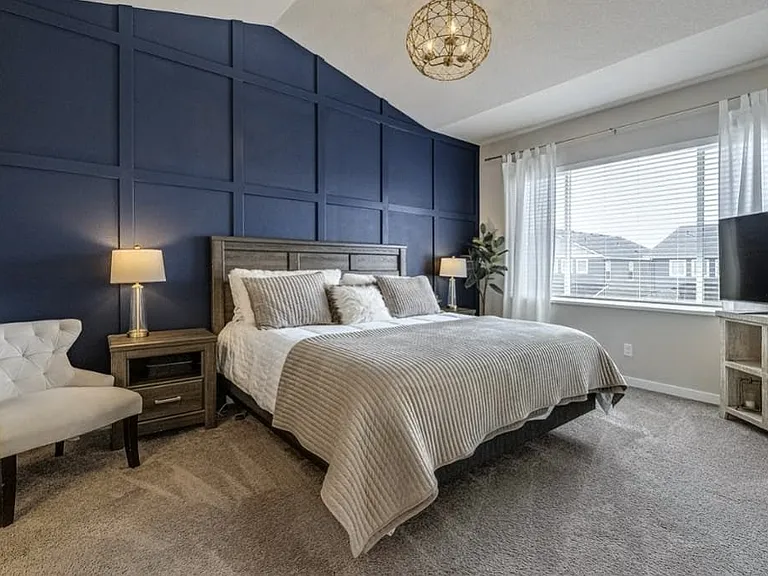 High Ceiling with accent wall at the primary bedroom.