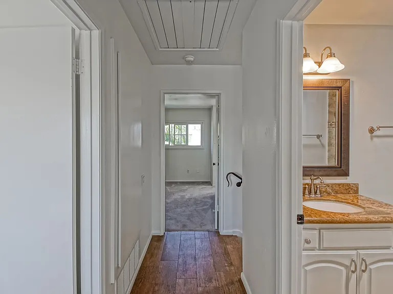 7148 Island Village Dr — Photo 29