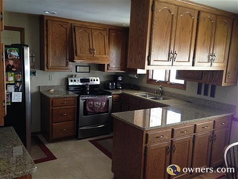 Granite and tile in the kitchen.