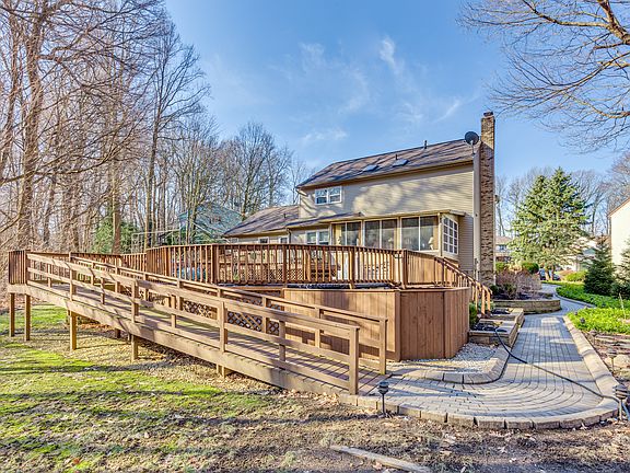 Brick pavers lead to deck 