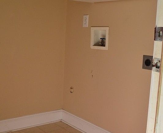 Laundry room attached to garage