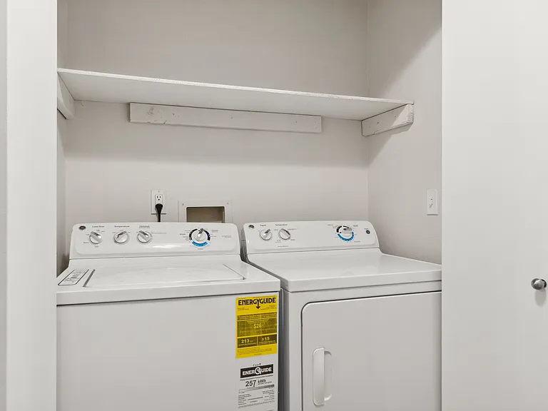 Convenient in-home laundry with extra storage.