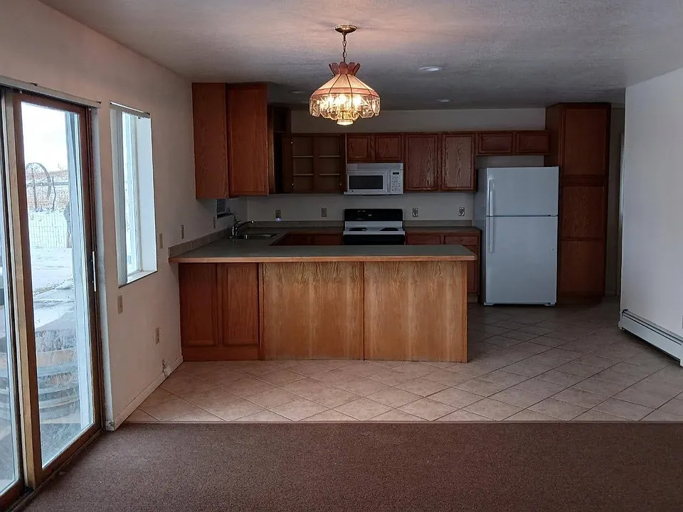 Living room, looking toward kitchen