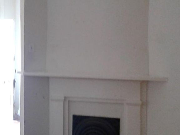 living area/dining room fireplace (sealed)