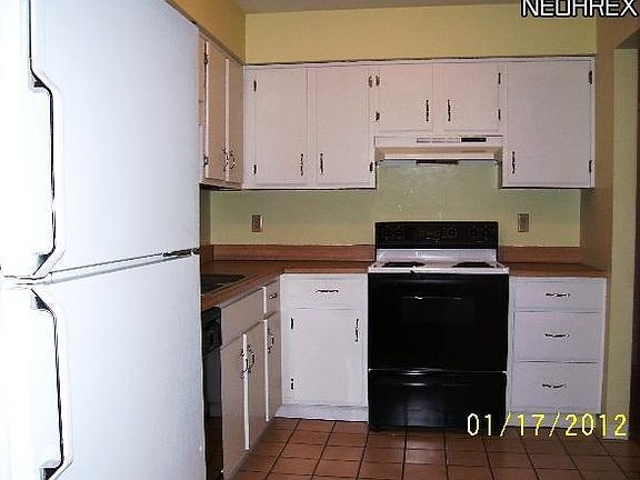 kitchen includes refrigerator and dishwasher