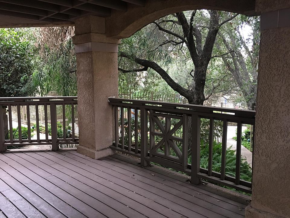 Patio surrounded by Live Oak trees