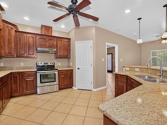 4th image of 10320 E 37th Pl