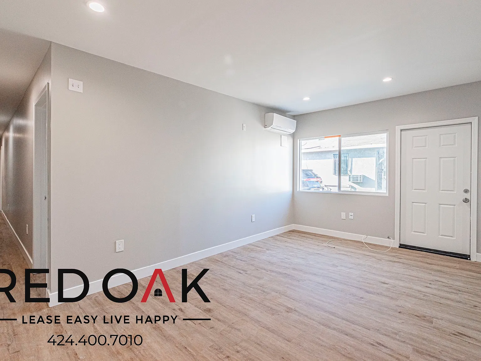 Sunlit 4-Bed with Stainless Steel Appliances, Air Conditioning, In-Unit Laundry and Parking Inclu... — Photo 2