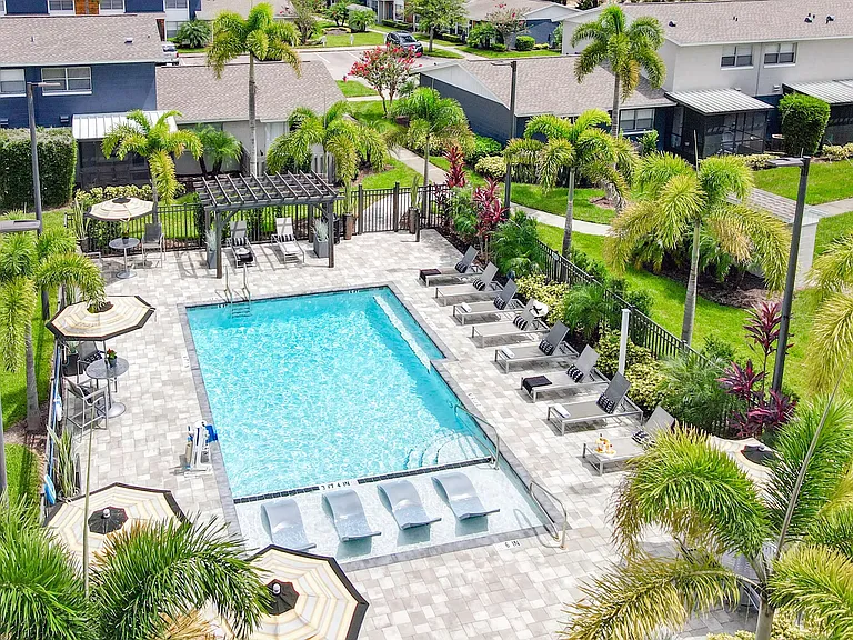 Lay back and soak in the sun on our spacious, beautifully paved sundeck by the sparkling pool.