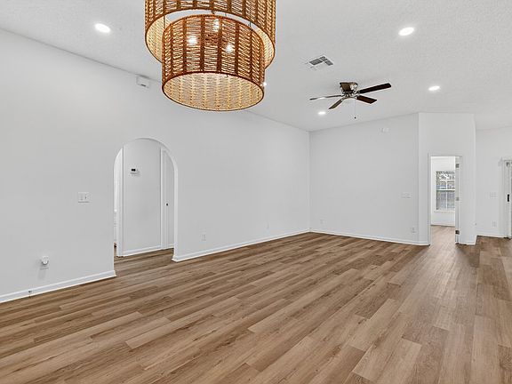 Light over dining area, fan over living space