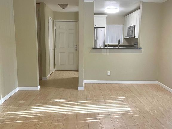 Living Room (looking from patio to entrance)