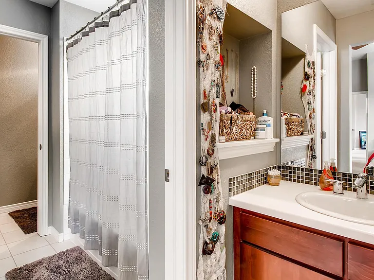Jack and Jill sinks with Full Bathroom in between