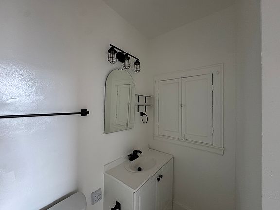 Bathroom - New Paint, New Lighting, New Vanity, New Toilet -