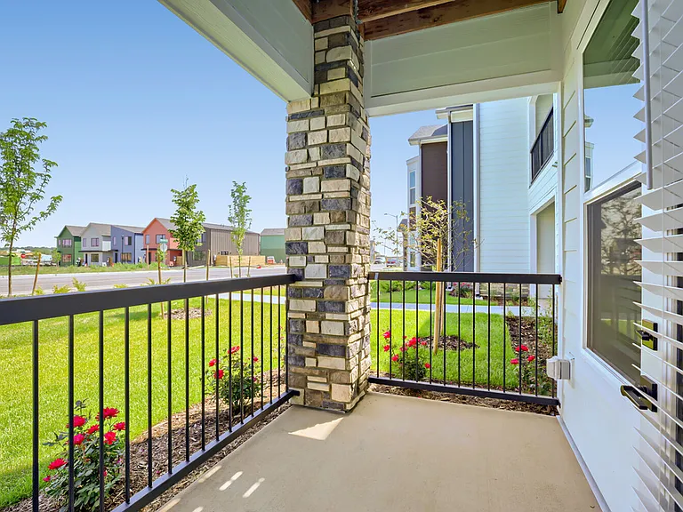 Step outside to your private porch and take in the Colorado sunshine, landscaped grounds, and the energy of the growing Harvest Junction neighborhood. Garrett Harvest Junction West, Longmont, CO.