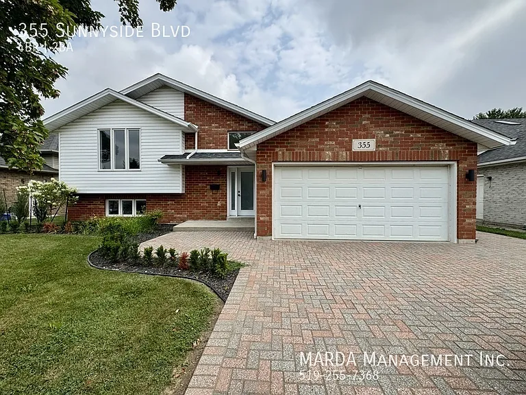 355 Sunnyside Blvd — Photo 1