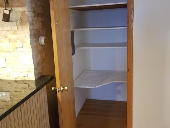 large storage closet in the living room area.