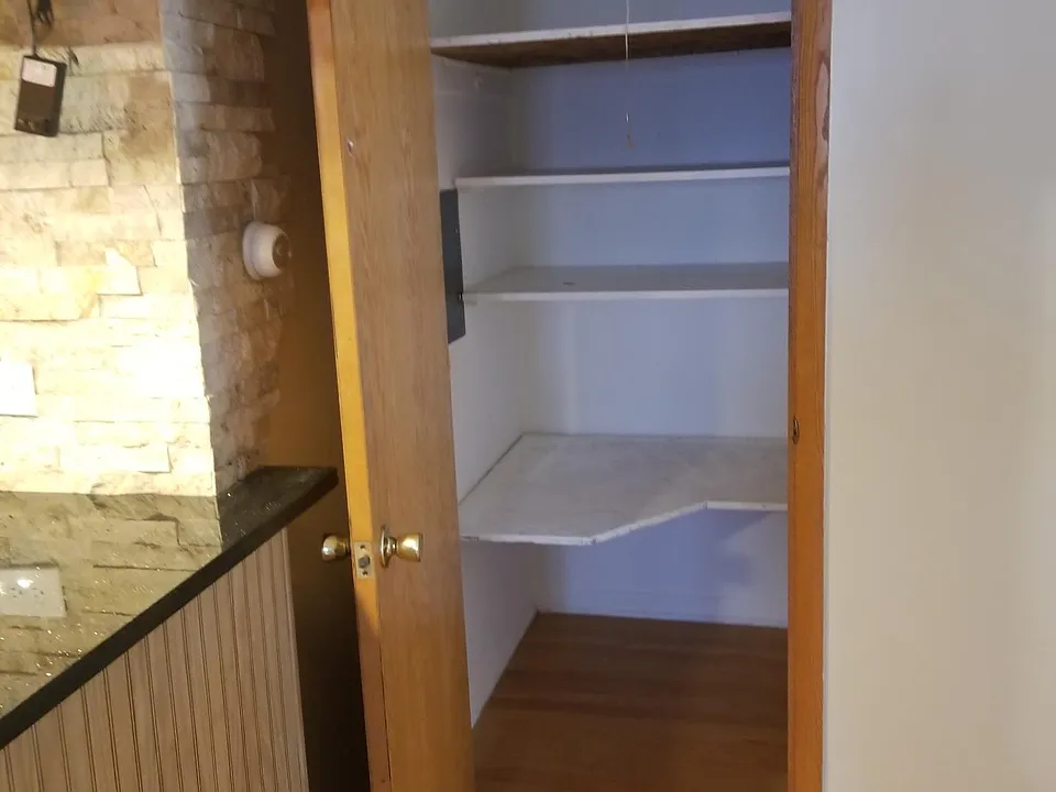 large storage closet in the living room area.
