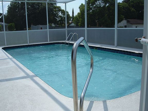 Screen Enclosed In Ground Pool