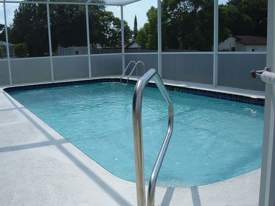 Screen Enclosed In Ground Pool