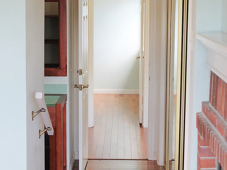Master bedroom hallway through to second floor landing and second bedroom