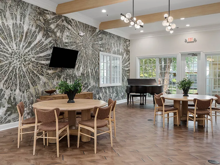 Multipurpose room with piano and seating
