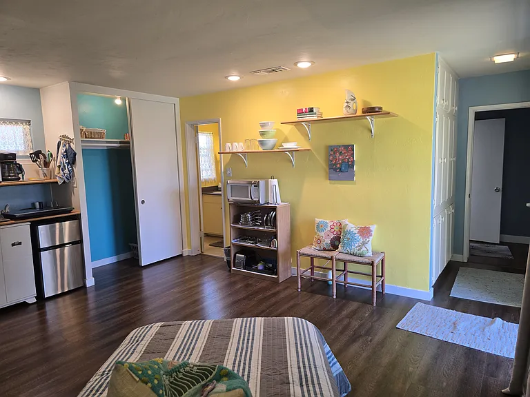 Looking across the apartment. Hallway to the laundry.