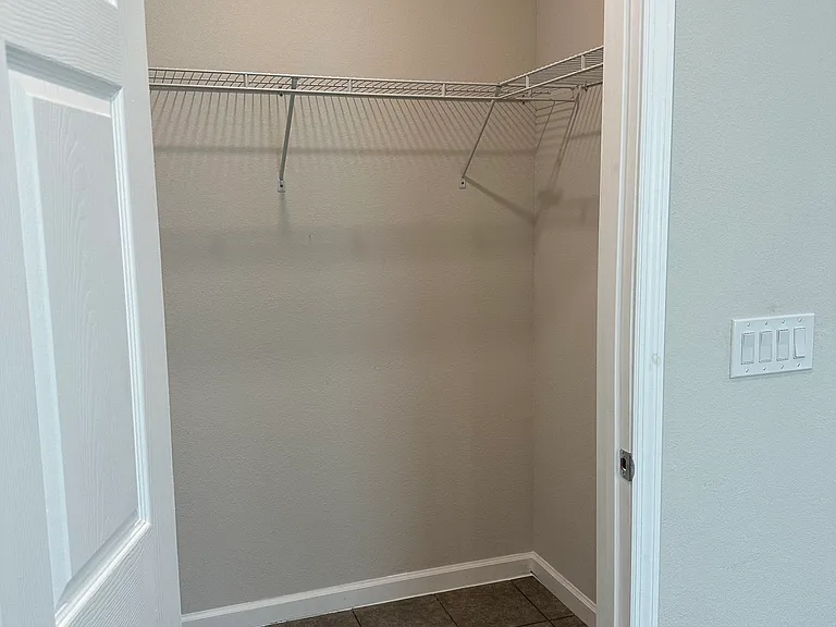 Walk-In Closet in Primary Bedroom