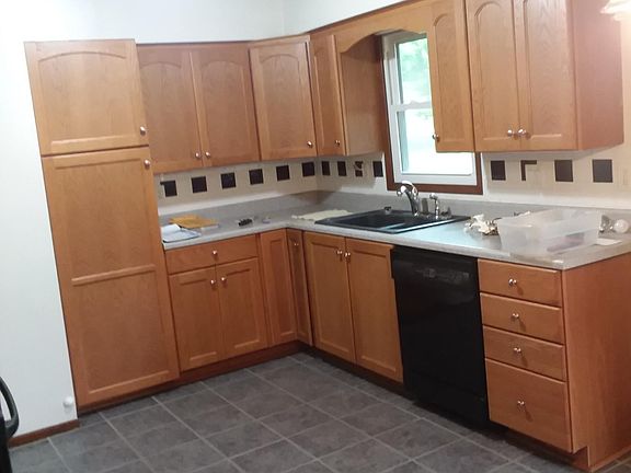 Lots of cabinet space in this very functional kitchen.