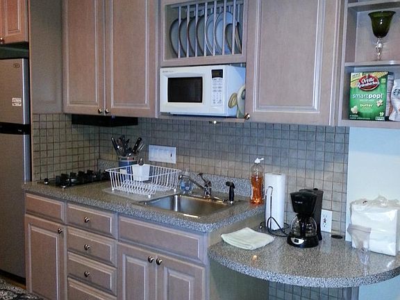 Kitchen w/refrigerator & 2 burners