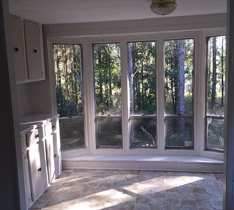 Forest view from bay windows in dining area