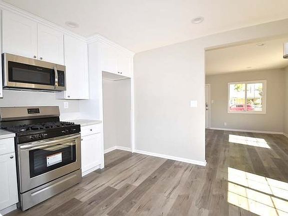 Refrigerator not pictured but included.