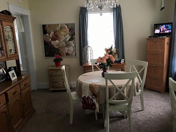 Dining room depicted with furniture