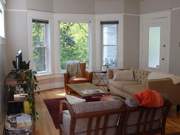 2nd photo of living room and kitchen.