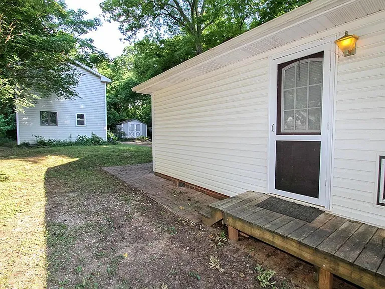 Side door exit to porch and backyard