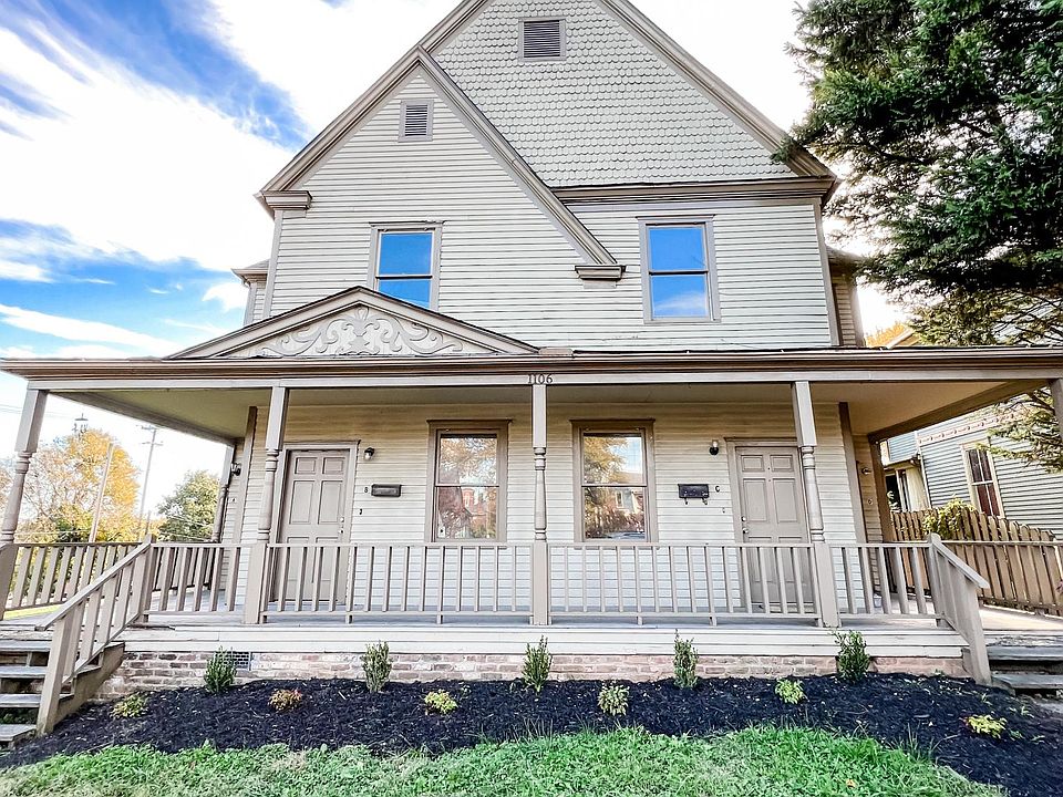 Front of house. Open lot to the left and quiet single family home next door.